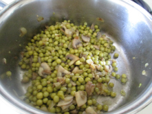 Adding Peas to the Sauteed Mushrooms