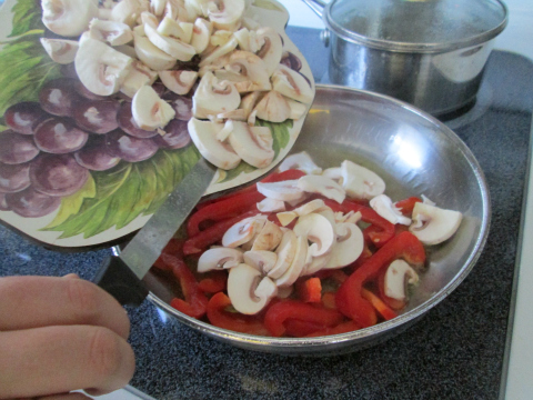 Adding Sliced Mushrooms