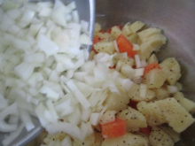 Adding the Onions to the Veggies
