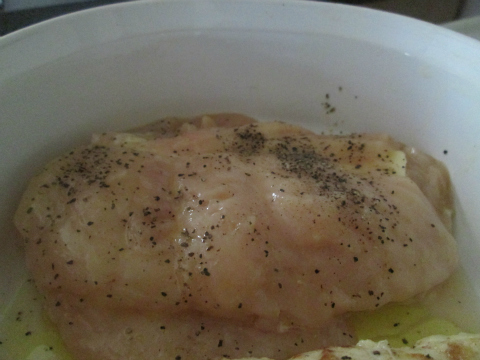 Placing chicken wrap in casserole dish