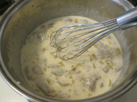 Stirring Sour Cream and Mushrooms Well