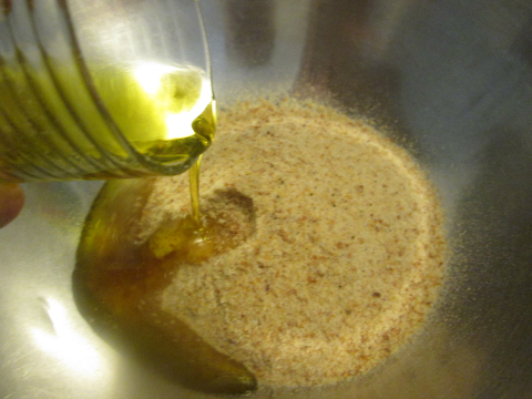 Adding Oil to Bread Crumbs