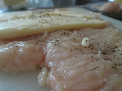 Adding cheese to chicken breast