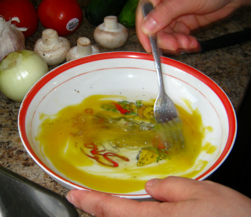 Beating Eggs with Salt and Pepper  