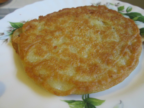 Getting Potato Pancake Ready for Chicken Stew