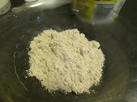 Placing Flour in a Bowl